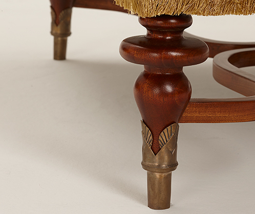 The ferrules on the feet of a Bruce Andrews Design Highland chair