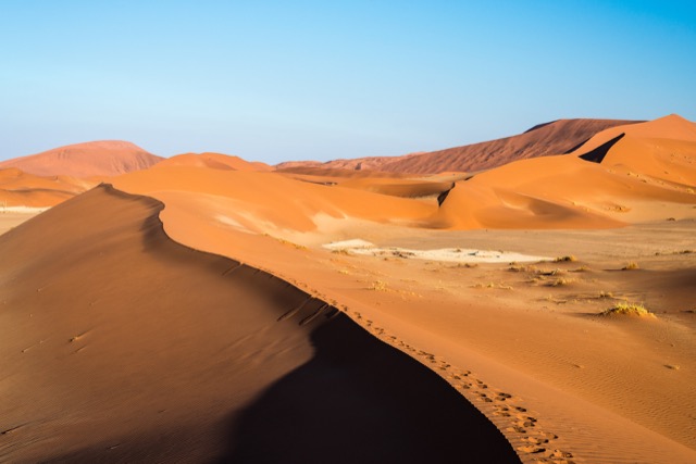 Scenic ridges of sand dunes in Namibia, Africa.