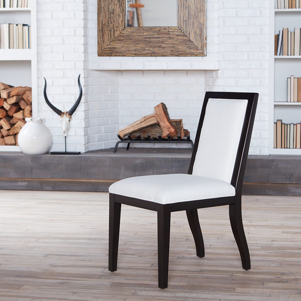 Modern dining chair upholstered in linen from Bruce Andrews Curated